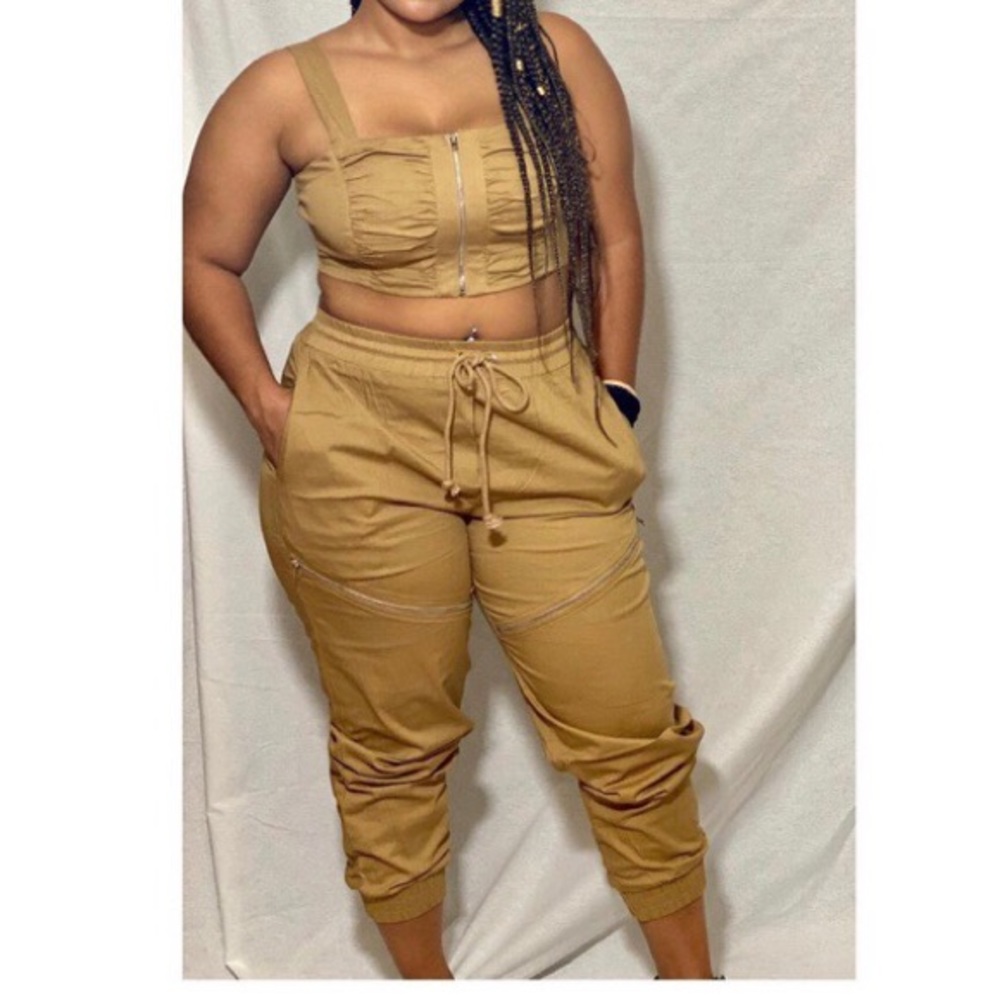 Beige Jogger Set with zipper fastening on top.
